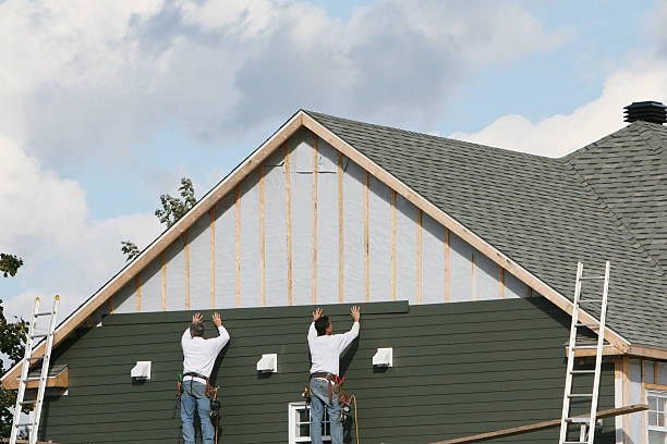 Professional Emergency Siding Repair technician working in Smithton, IL